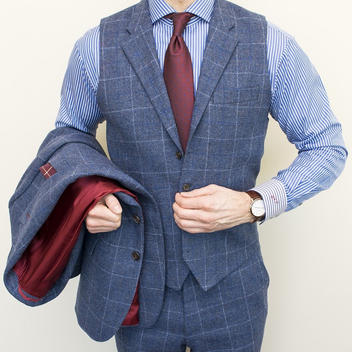 three piece suit with a double breasted waistcoat 1